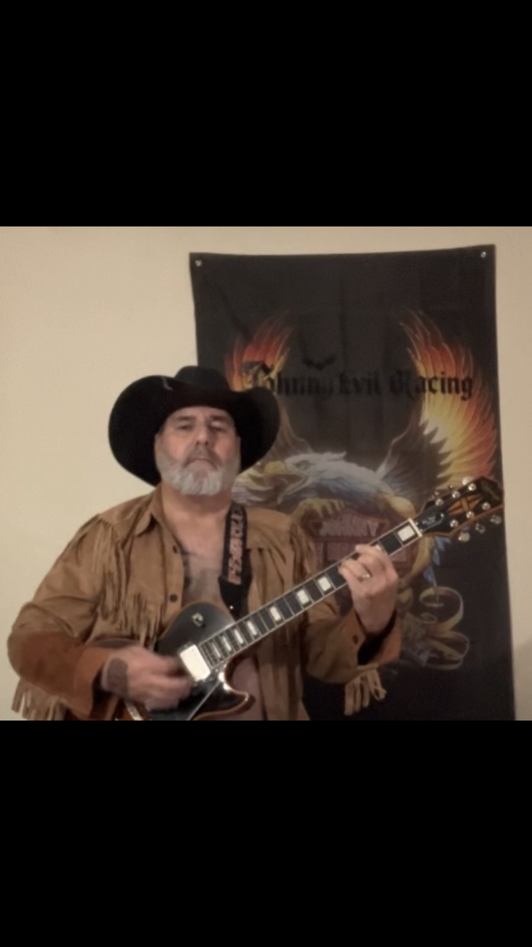 Johnny Evil Racing guitarist performing